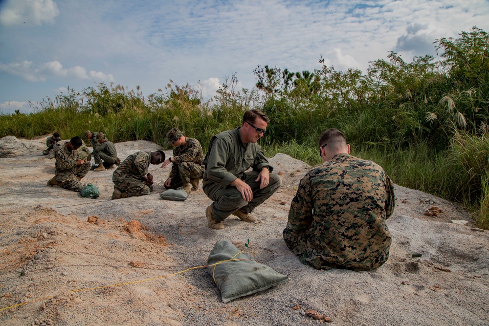 Service members gain knowledge in basic explosive ordnance disposal procedures