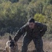 Working dog handlers conduct bite training scenarios