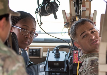 Platoon leader checks on progress