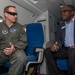 U.S. Air Force Maj. Philip Gause speaks with Jowel Laguerre, civic leader, onboard a T-1 Jayhawk aircraft Nov. 6, 2019