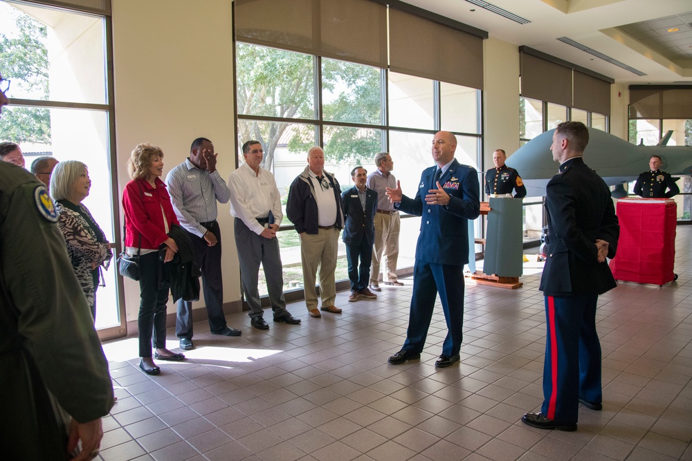 U.S. Air Force Lt. Col. Eric Bissonette speaks with civic leaders during a demonstration of the Marine Corps birthday Nov. 6, 2019