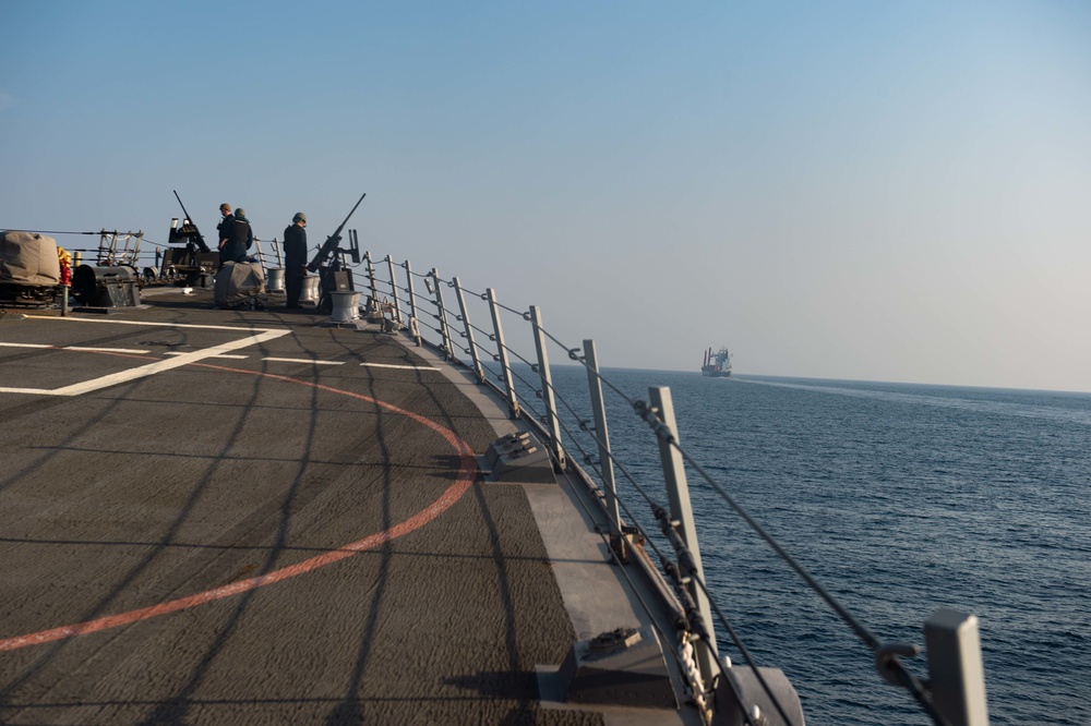 USS Farragut escorts Merchant Vessel Mohawk throught the Straits of Bab el-Mandeb