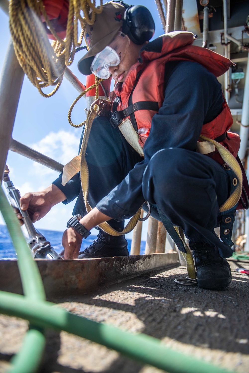 Sailors Conduct Preservation Aboard USS Harpers Ferry