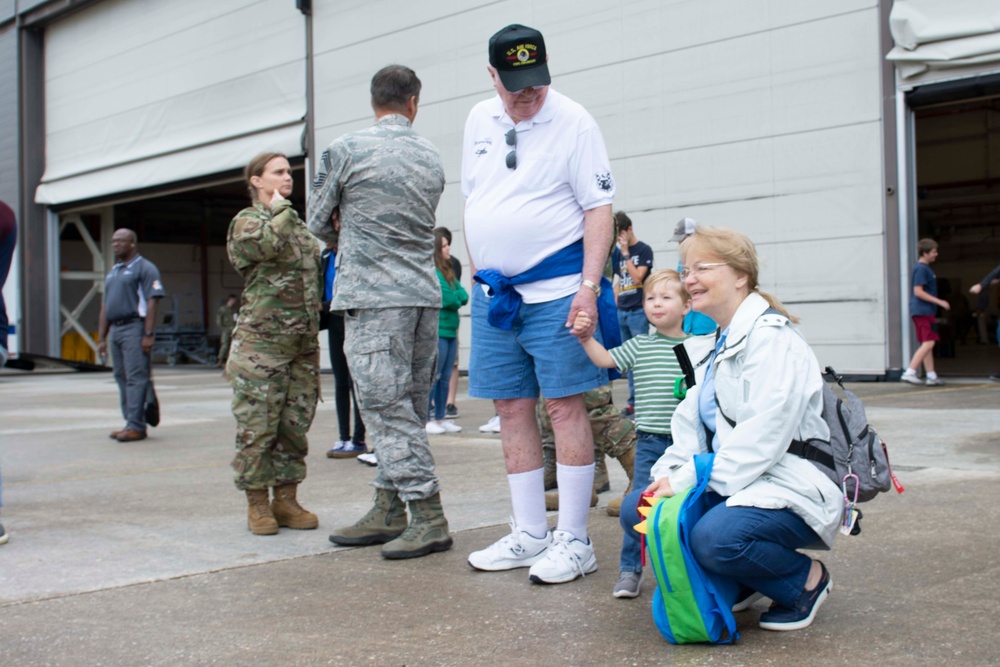 Community partners and students visit the 125th Fighter Wing