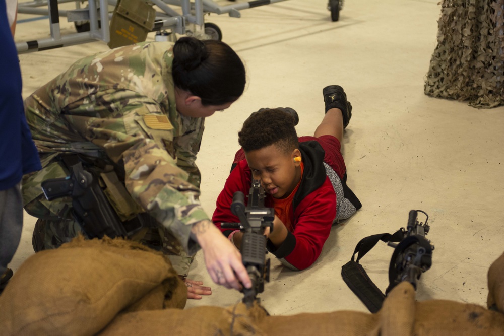 Community partners and students visit the 125th Fighter Wing