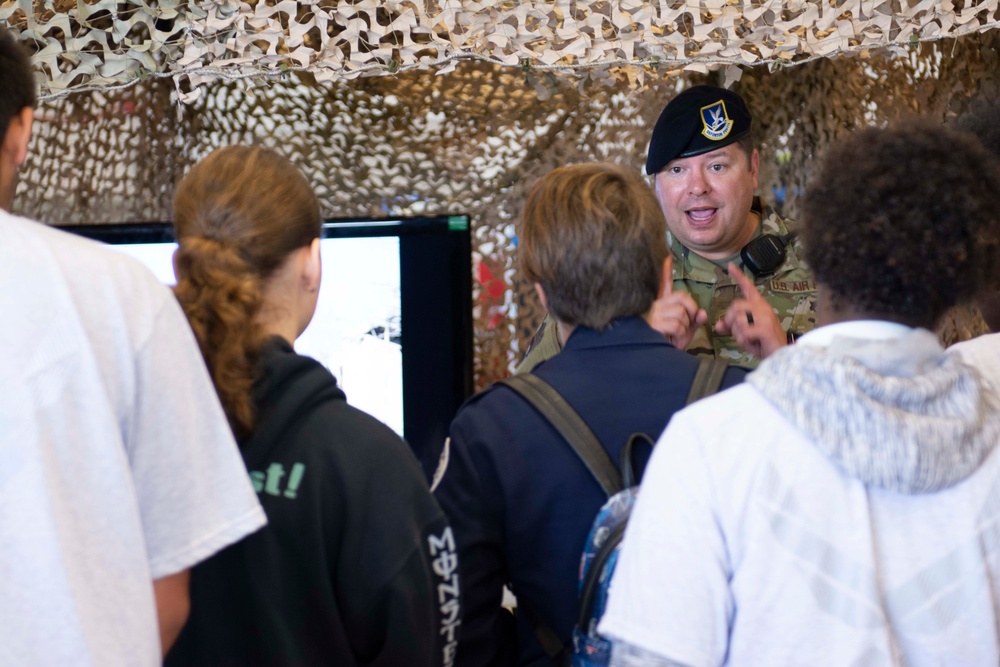 Community partners and students visit the 125th Fighter Wing