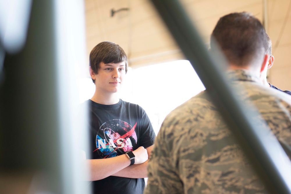 Community partners and students visit the 125th Fighter Wing