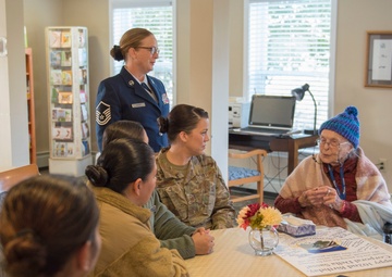 102nd IW Airmen thank WWII vet for legacy of service on her 102nd birthday