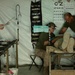 Corpsman performs suture on Marine
