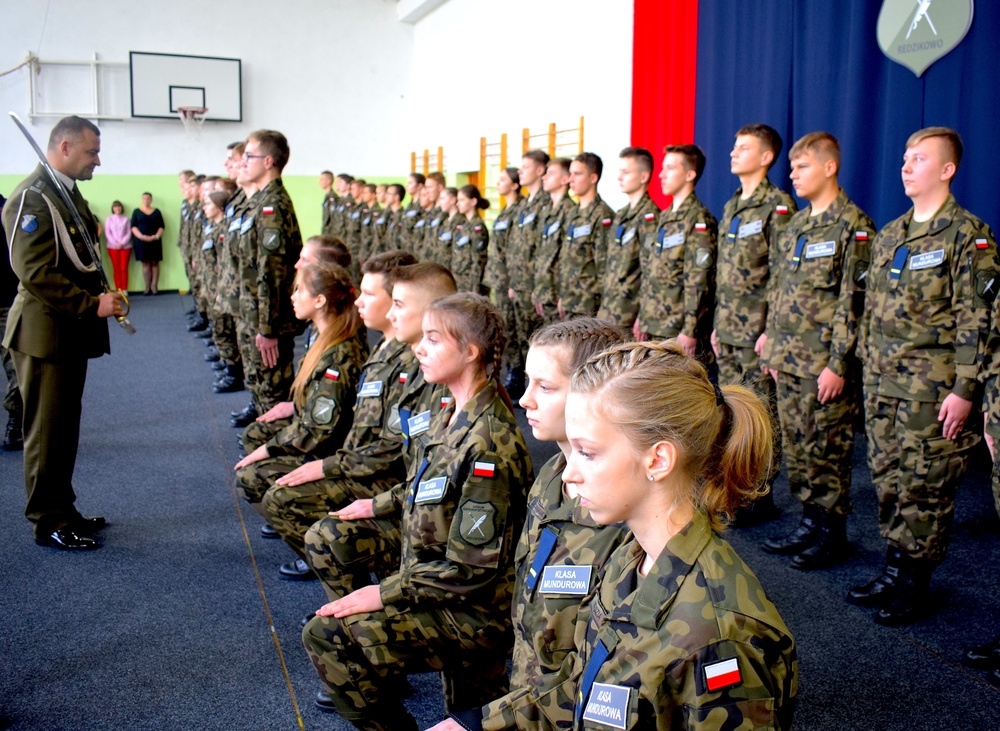 U.S. Navy leadership attends military cadet induction at local school in Poland