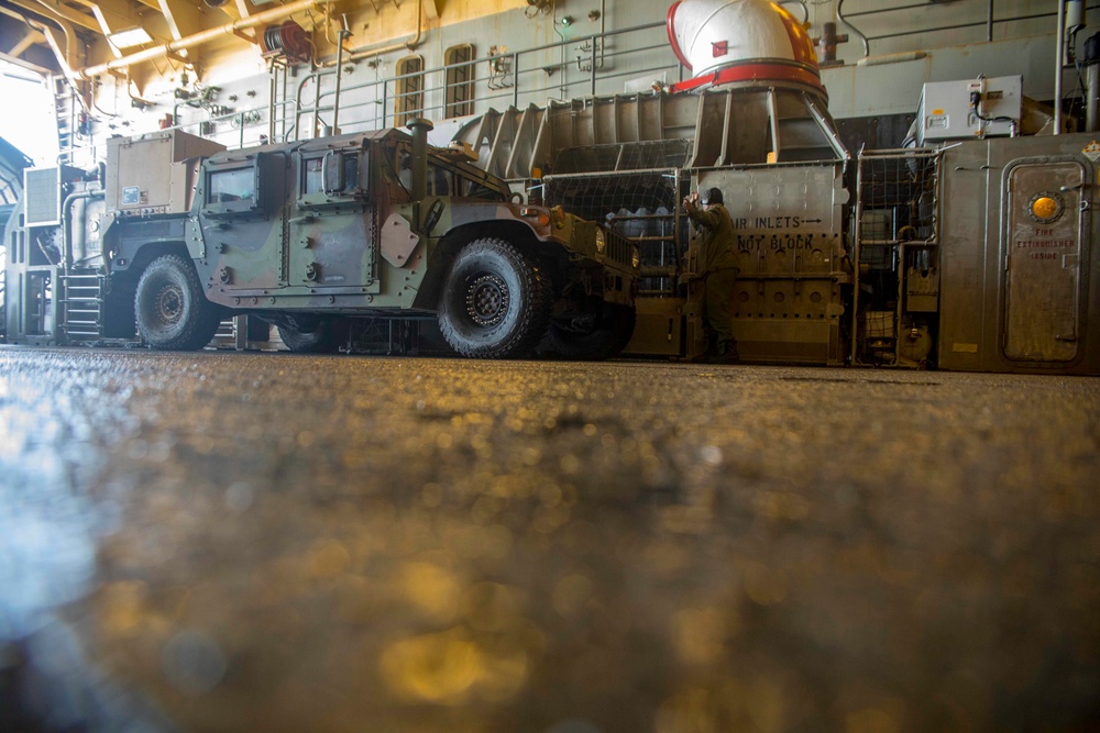 Sailor directs humvee