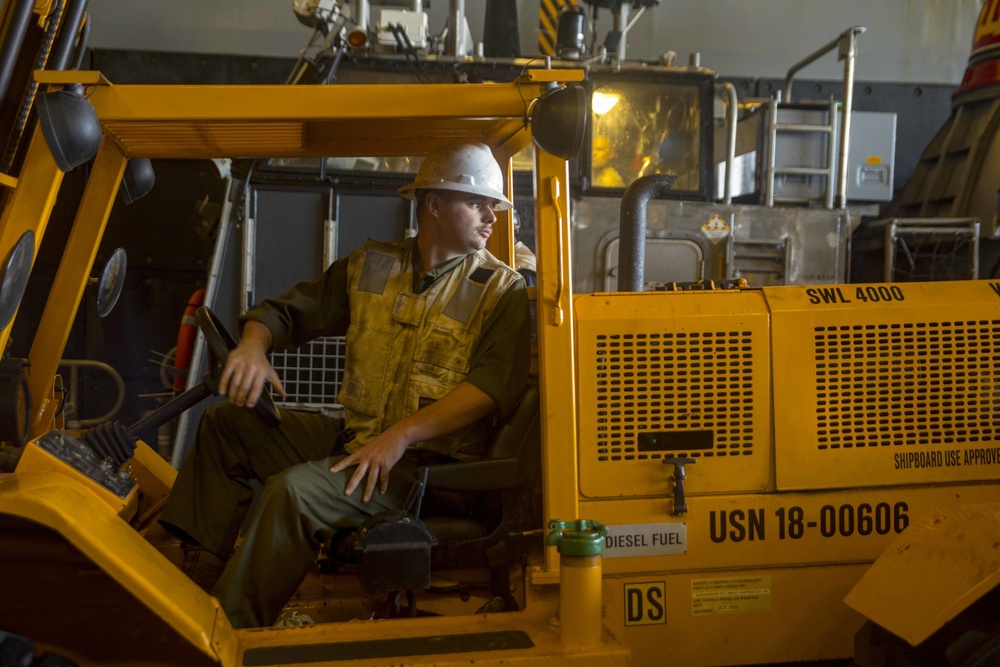 Marine reverses a forklift