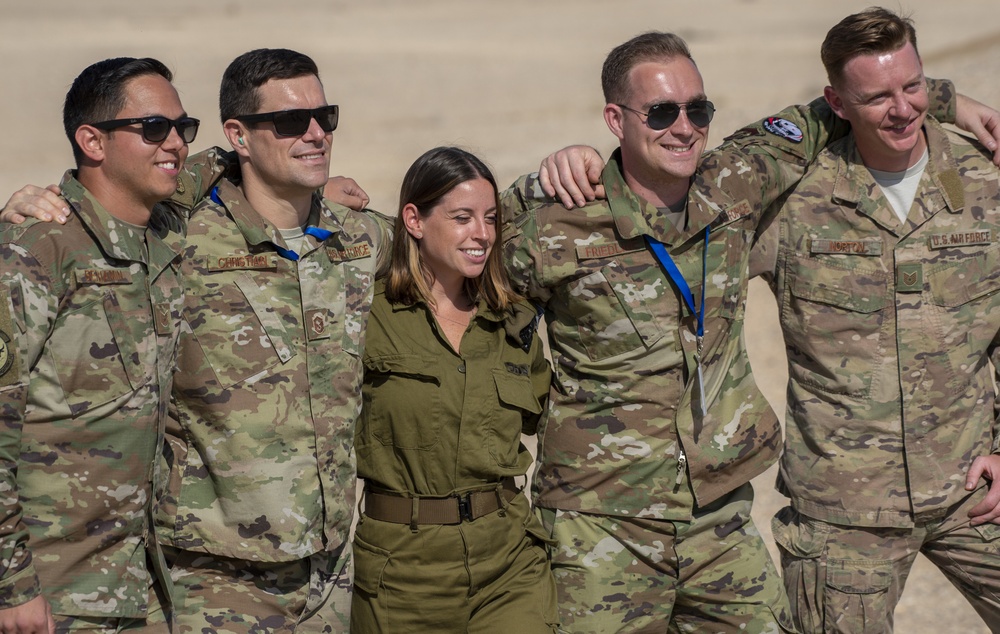 Israeli Defense Force members visit with U.S. Air Force service members