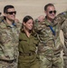 Israeli Defense Force members visit with U.S. Air Force service members