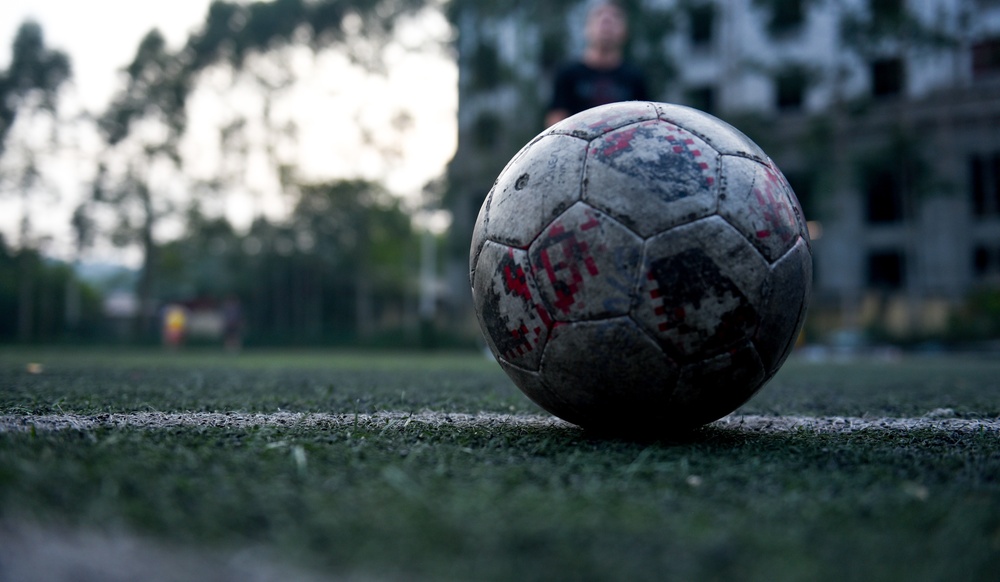 A DPAA recovery team plays soccer to build partnerships