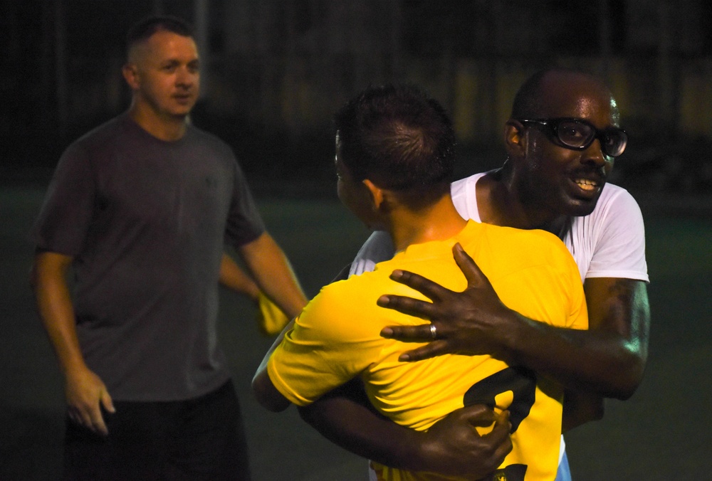 A DPAA recovery team plays soccer to build partnerships