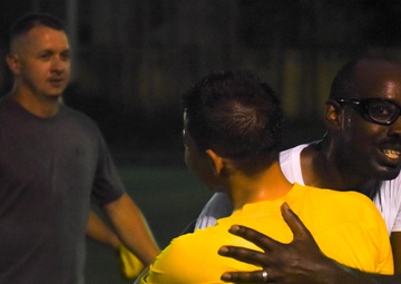 A DPAA recovery team plays soccer to build partnerships