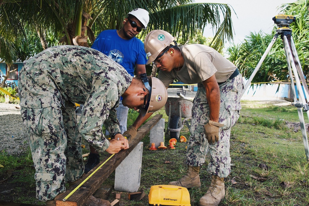 U.S. Navy Seabees deployed with NMCB-5’s Detail Marshall Islands set up the Ennibur Evacuation Center project site