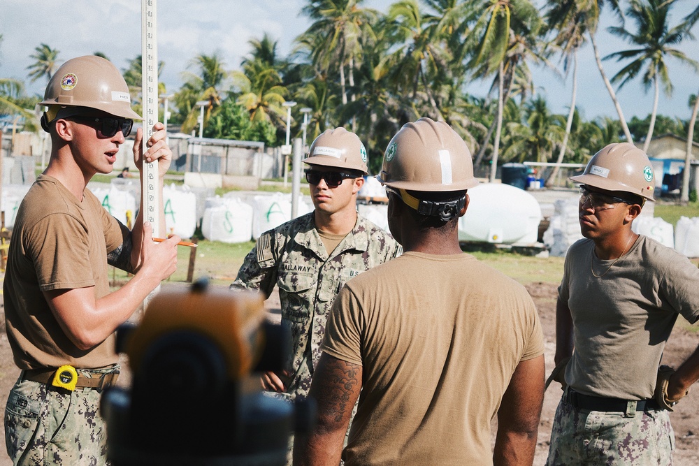 U.S. Navy Seabees deployed with NMCB-5’s Detail Marshall Islands set up the Ennibur Evacuation Center project site