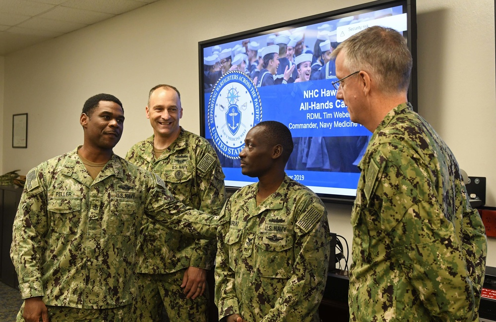 Rear Adm. Weber recognizes Petty Officer First Class Muriuki