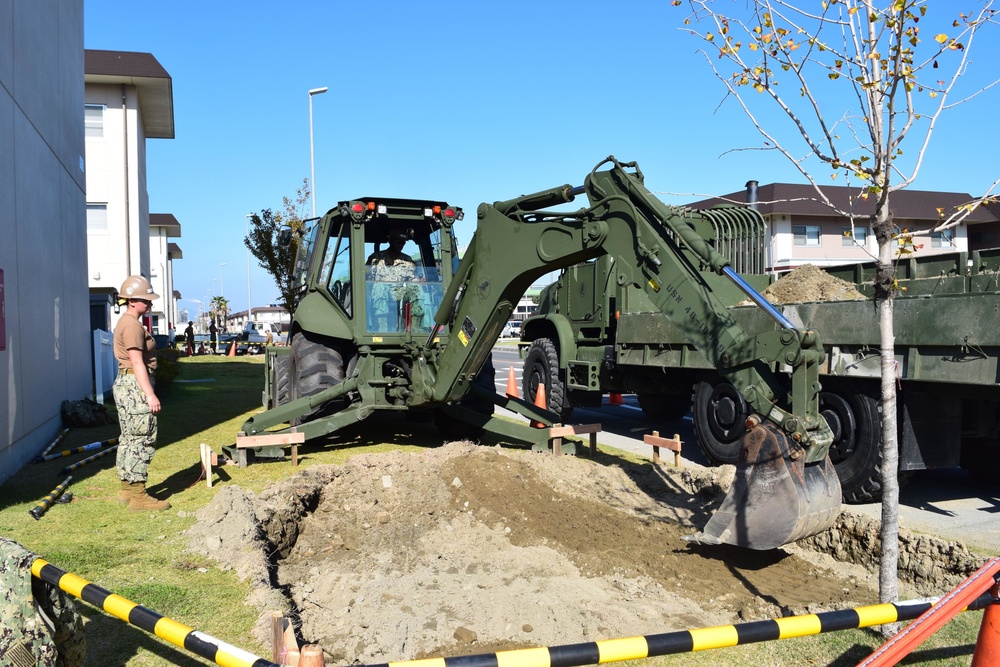 NMCB-5's Detail Iwakuni prepares the project site for environmental trash enclosures