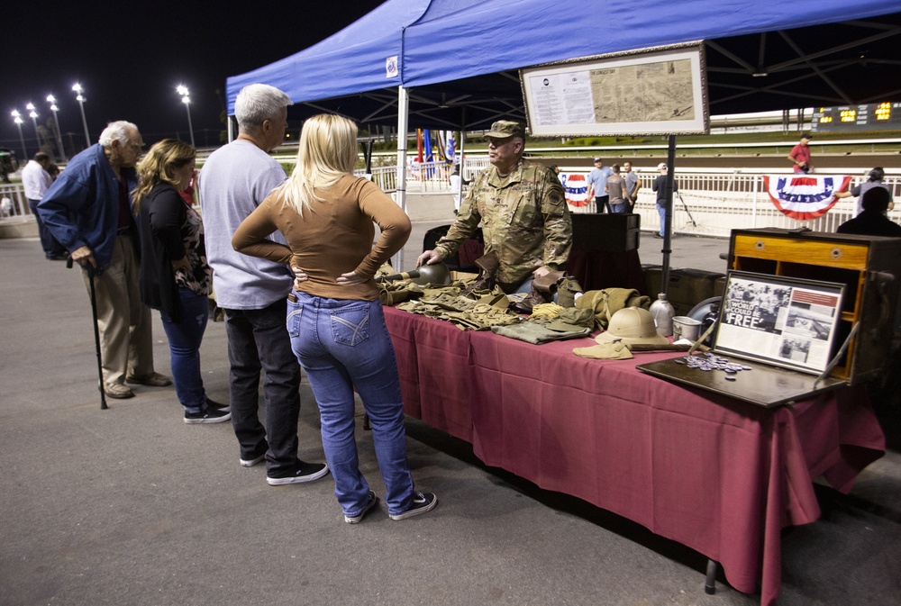 Soldiers participate in Honoring Our Veterans Night at the Races