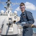 A Sailor Aboard USS Milius (DDG 69) Cleans the Mark 45 5 Inch Gun