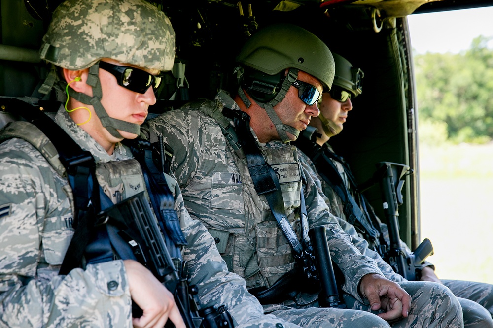 147th Attack Wing members practice hotloading onto a UH-60 Blackhawk