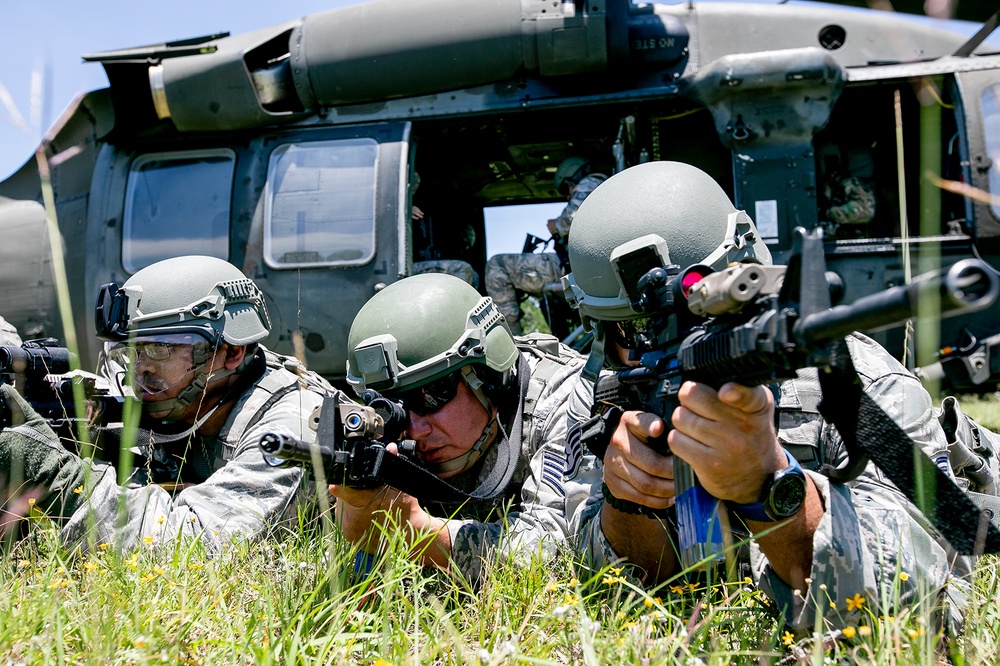 147th Attack Wing members practice hotloading onto a UH-60 Blackhawk