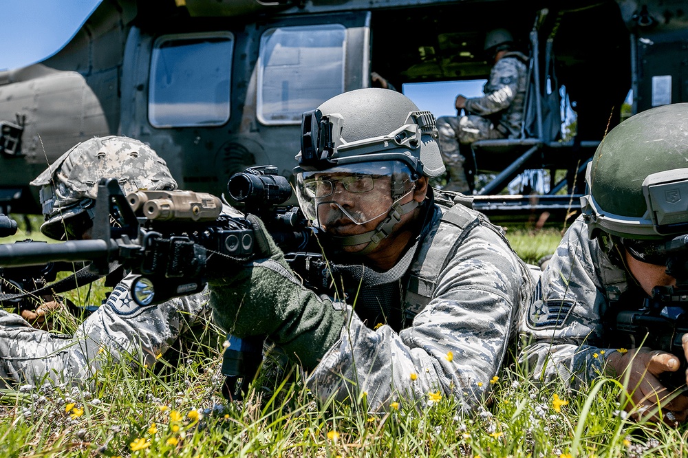 147th Attack Wing members practice hotloading onto a UH-60 Blackhawk