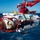 The image shows a submarine rescue vehicle designated 'Dolphin 172', operated by JFSRS (Joint Foreign Submarine Rescue System), being deployed or recovered at sea. The vessel is identified as LR5 Fremantle and bears an Australian flag insignia. It is suspended by a red crane/davit system from a support ship, with calm blue ocean and a distant vessel visible in the background.