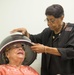 Lucy Richardson started working in the Randolph Air Force Base beauty salon 50 years ago and overcame prejudices of the time.