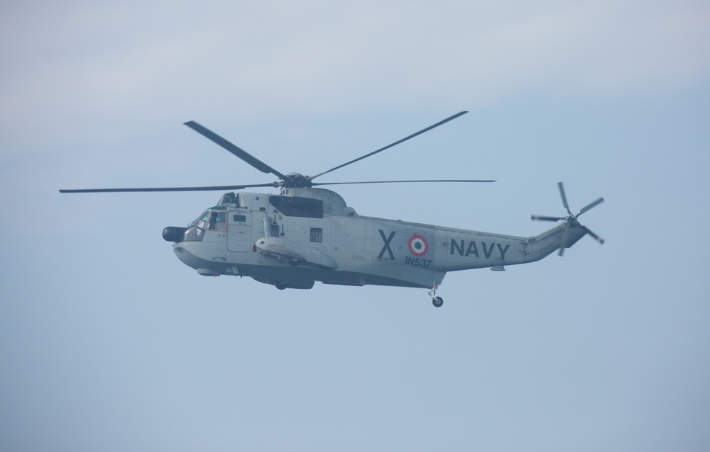 Indian Navy UH-3H Sea King Helicopter land on USS Germantown during exercise Tiger TRIUMPH