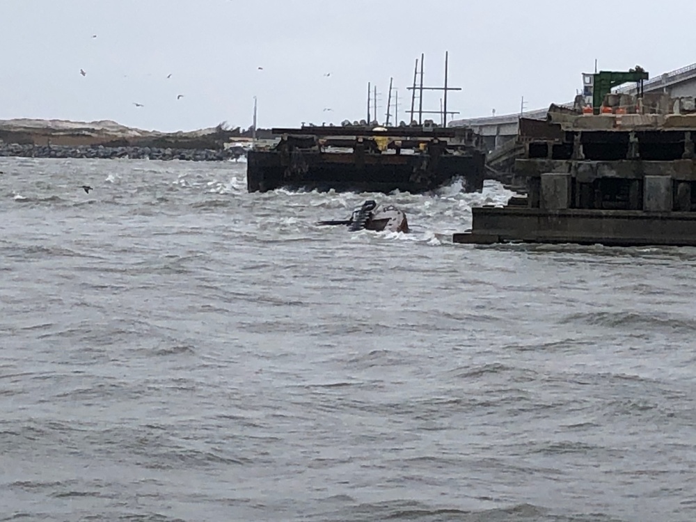 Coast Guard responds to diesel discharge from semi-submerged tug in Oregon Inlet, NC