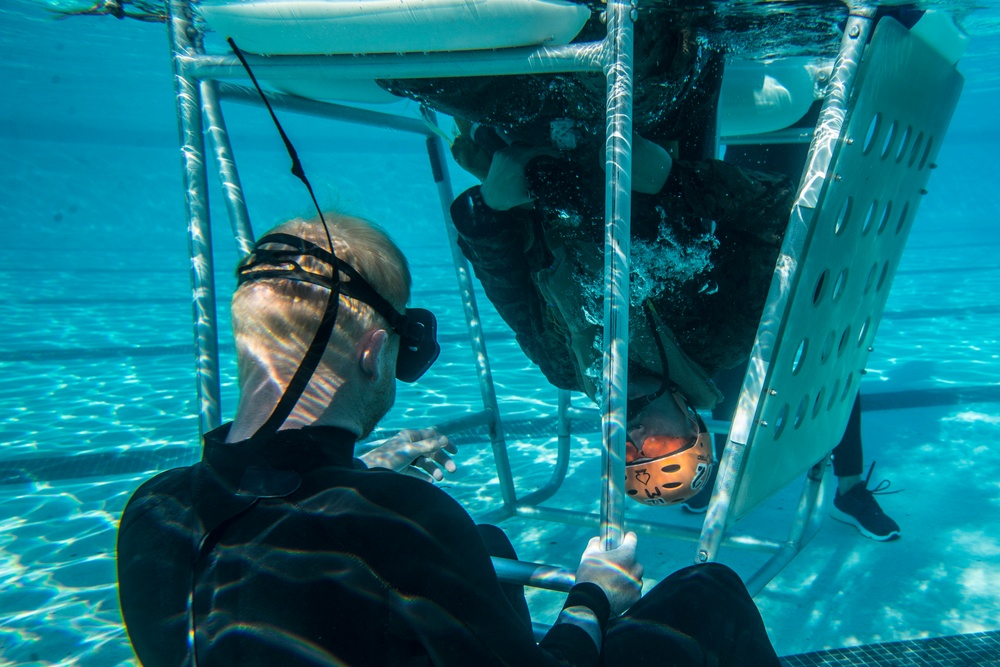 Pendleton Marines submerge in underwater helicopter egress training