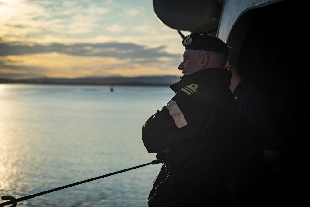 SNMG1's Staff Operations Officer Looks out from USS Gridley