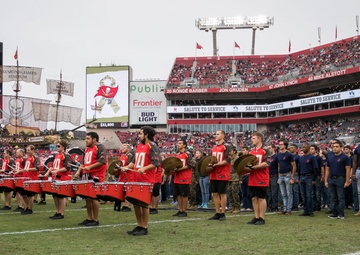 USCENTCOM commander delivers Oath of Enlistment during Buccaneers game