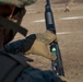 U.S. Marines with 1st LE Bn. familiarize themselves with non-lethal weapons