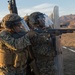 U.S. Marines with 1st LE Bn. familiarize themselves with non-lethal weapons