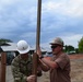 U.S. Navy Seabees deployed with Naval Mobile Construction Battalion 5's Detail Timor-Leste prepare for construction on an education center