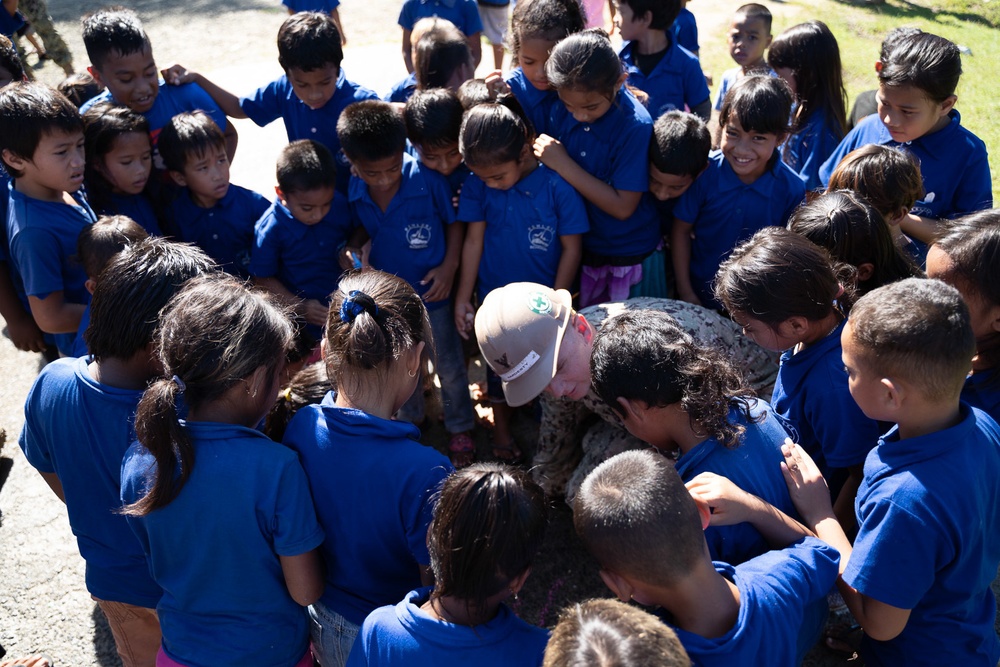 U.S. Navy Seabees deployed with NMCB-5’s Detail Pohnpei attend Pehleng Elementary Opening Ceremony