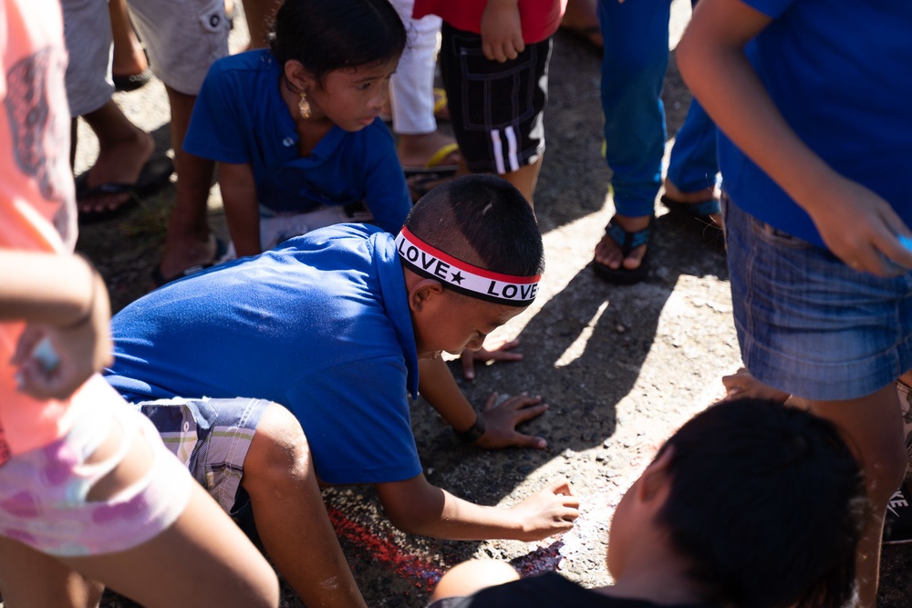 U.S. Navy Seabees deployed with NMCB-5’s Detail Pohnpei attend Pehleng Elementary Opening Ceremony