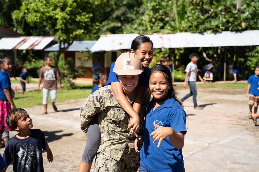 U.S. Navy Seabees deployed with NMCB-5’s Detail Pohnpei attend Pehleng Elementary Opening Ceremony