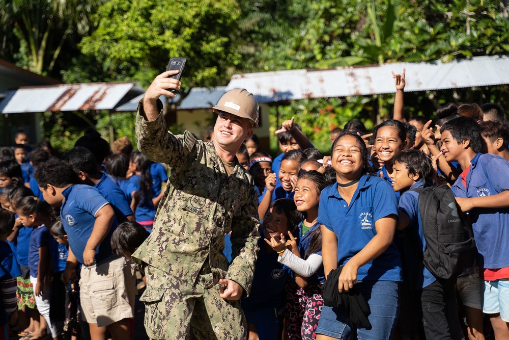 U.S. Navy Seabees deployed with NMCB-5’s Detail Pohnpei attend Pehleng Elementary Opening Ceremony