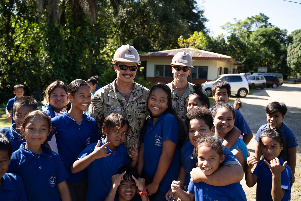 U.S. Navy Seabees deployed with NMCB-5’s Detail Pohnpei attend Pehleng Elementary Opening Ceremony