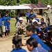 U.S. Navy Seabees deployed with NMCB-5’s Detail Pohnpei attend Pehleng Elementary Opening Ceremony