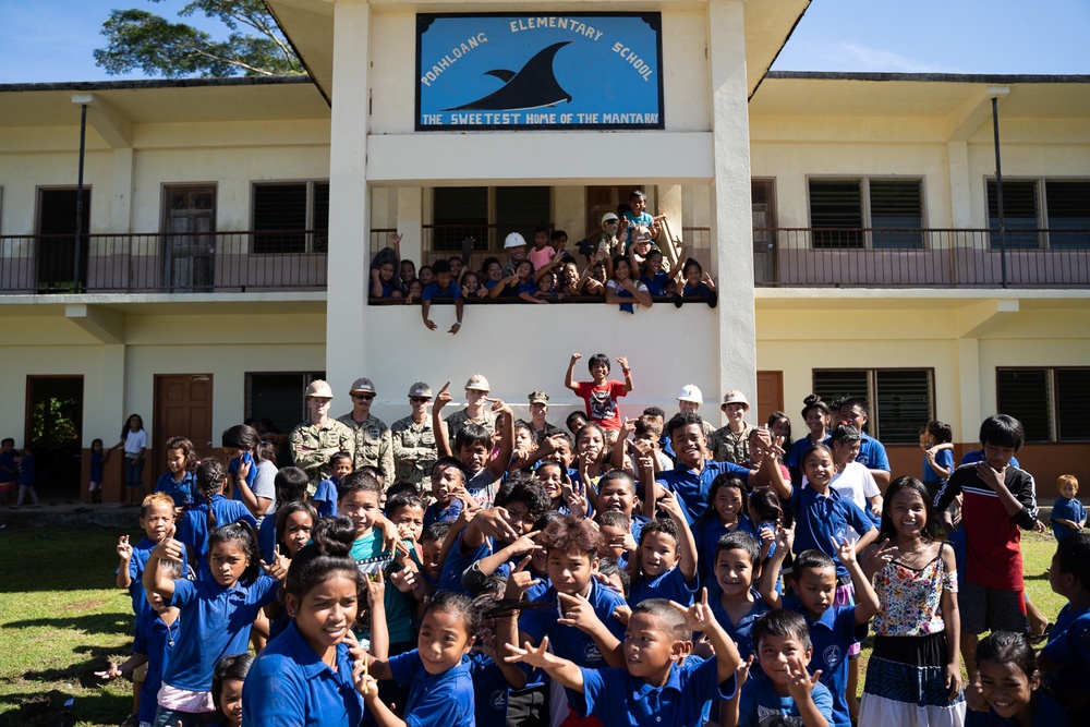 U.S. Navy Seabees deployed with NMCB-5’s Detail Pohnpei attend Pehleng Elementary Opening Ceremony