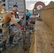 U.S. Navy Seabees deployed with Naval Mobile Construction Battalion 5’s Detail Sasebo place concrete for the seawall port repairs on Commander Fleet Activities Sasebo