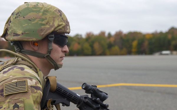 U.S. Army Soldier Awaits U.S. Marine Corps MV-22B Osprey During Combined Unit Exercise