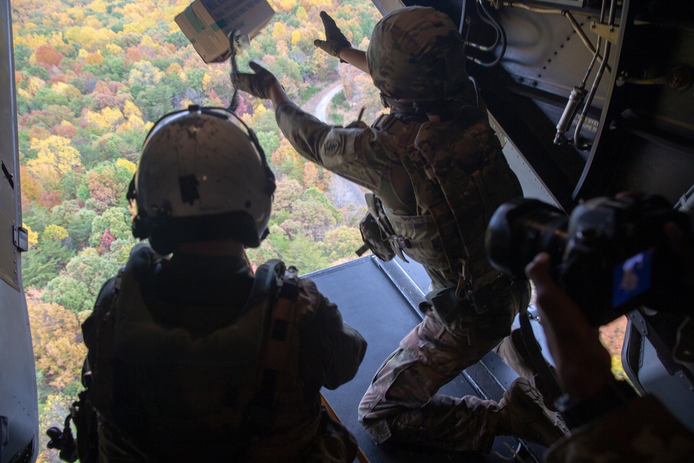 U.S. Army Soldiers Drops Leaflets Off U.S. Marine Corps MV-22B Osprey